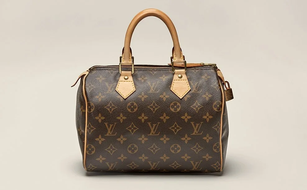 Louis Vuitton monogram canvas speedy handbag with tan leather handles and trim